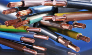 How do I calculate the required wire cross section based on the load power?