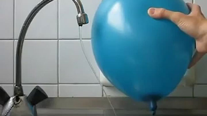 Static electricity deflects a stream of water sideways