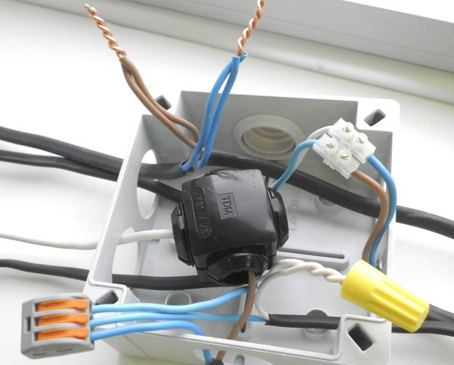 Wires in the junction box with a nut clamp