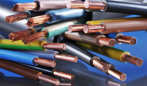 How do I calculate the required wire cross-section based on the power of the load?