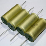 How do you determine the polarity of electrolytic capacitors, where is the plus and minus?