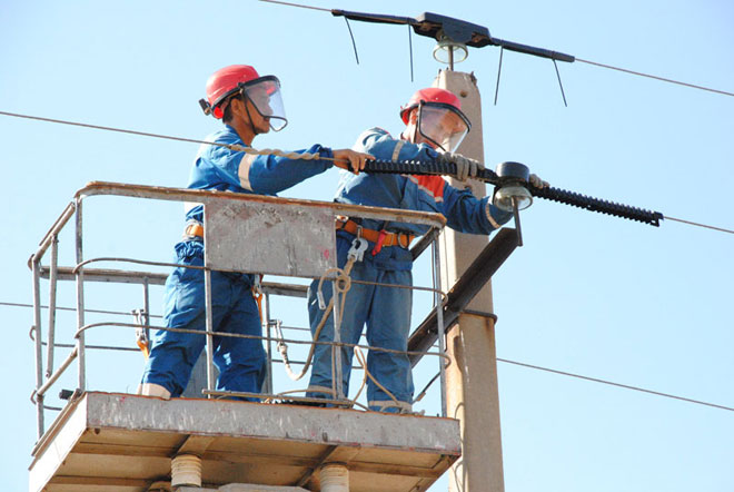 Overhead line installation by electricians. 