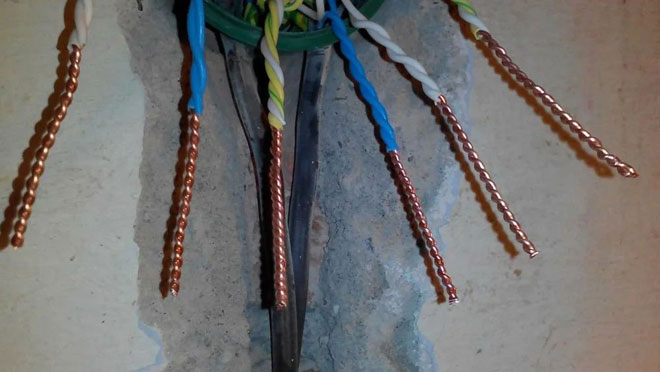 Connecting wires by twisting. 